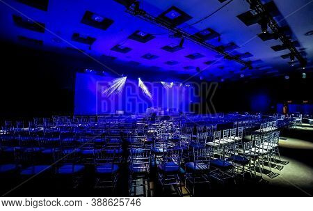 Empty Chairs In Large Conference Hall For Corporate Convention Or Lecture
