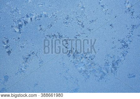 Ice And Frost On A Window Pane In Winter. Weather Forecast: Cold, Frost, Cooling. Abstract Backgroun