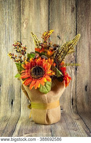 Bouquet Of Decorative Red Sunflowers Red Isolated On Wood Background. Thanskgiving Concept. Holidays