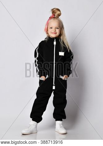 Happy Smiling Blonde Kid Baby Girl With Modern Hairstyle And Colorful Braids In Stylish Comfortable 