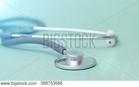 Stethoscope On Blue Background. Close-up Of Stetoscope