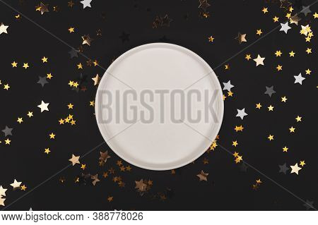 Black Background With Shiny Stars And Empty Plate Mock Up
