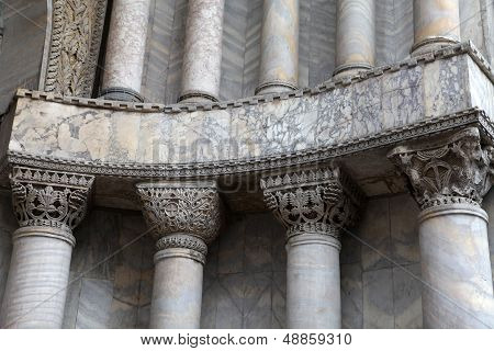 Venice - marble columns in the portal of the cathedral of St. Mark