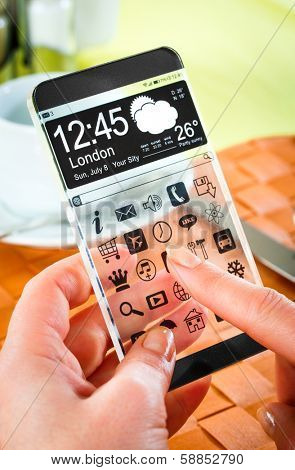Smartphone (phablet) with a transparent display in human hands. Concept actual future innovative ideas and best technologies humanity.