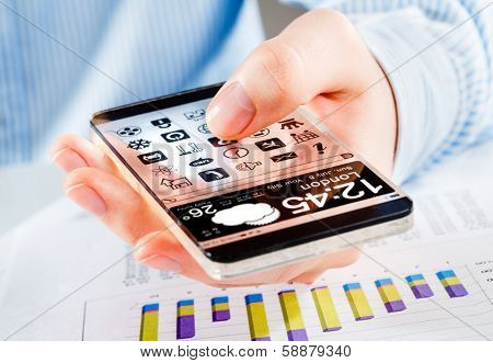 Smartphone (phablet) with a transparent display in human hands. Concept actual future innovative ideas and best technologies humanity.