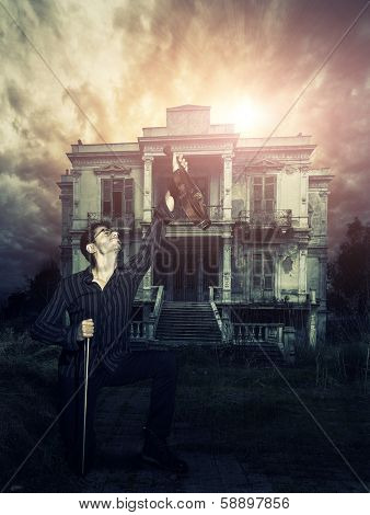 Male Violinist at the haunted house