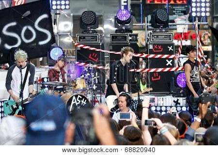 NEW YORK-JUL 22: (L-R) Michael Clifford, Ashton Irwin, Luke Hemmings and Calum Hood of 5 Seconds Of Summer perform on NBC's 'Today Show' at Rockefeller Plaza on July 22, 2014 in New York City.