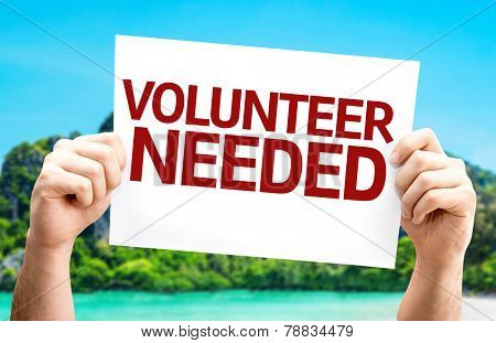 Volunteer Needed card with a beach on background