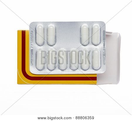 Yellow box with white pills blister pack