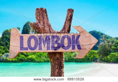 Lombok wooden sign with beach background