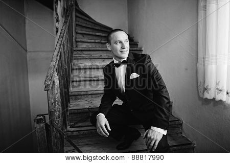 Groom Sat Down On The Stairs