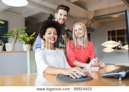 business, startup and people concept - happy creative team in office