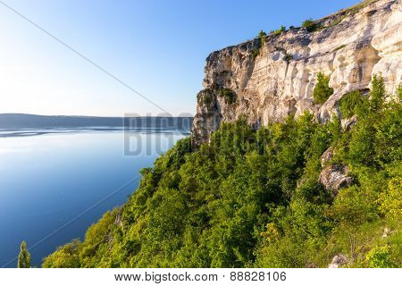 landscape with rocky lake shore in nice day