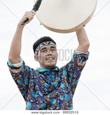Emotional Man Dancer Dancing With A Tambourine. Russia, Kamchatka