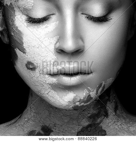 Beautiful girl with mud on his face. Cosmetic mask. Beauty face. Black&white photo