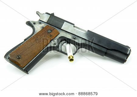 11 mm. Black gun isolated a white background.