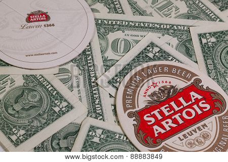 Beermats From Stella Artois And Us Dollars.