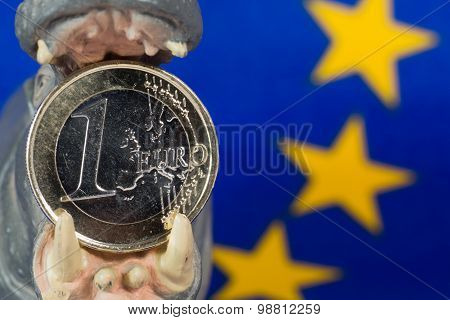 Euro Coin In Mouth Of A Hippo Figurine