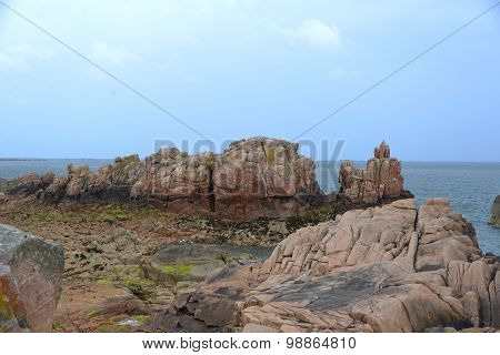 View of the coast. Large rock on coast