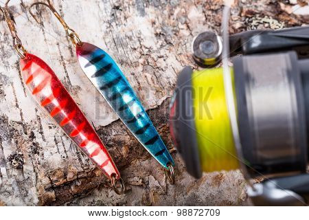 Closeup Fishing Baits Lures With Reel