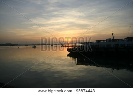 Sunset over river and industry