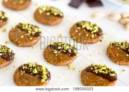 Vegan And Raw Pistachio Cookies On White Table