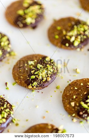 Vegan And Raw Pistachio Cookies On White Table