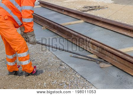 Align Piece Of Railroad Track Before Welding
