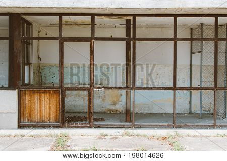 Empty street with abandoned buildig