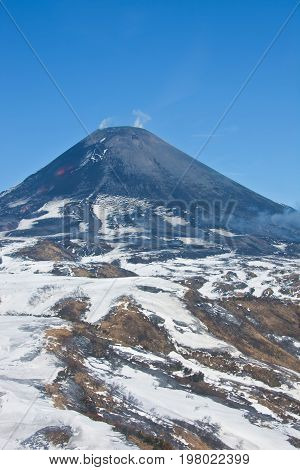 The views of the working Karymsky volcano in may 2016 with a helicopter. Kamchatka Russia