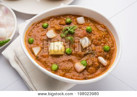 Pav bhaji or pavbhaji - popular Indian street food, selective focus