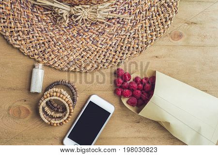 Summer Holiday, Vacation, Relaxation Concept. Raspberries, Straw Hat, Smartphone, Sunglasses From Ab