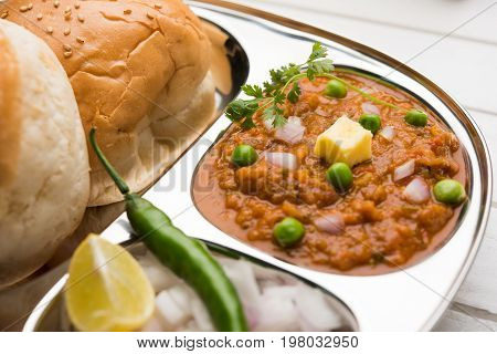 Pav bhaji or pavbhaji - popular Indian street food, selective focus