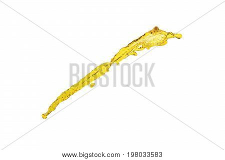 flying beautiful oil splah isolated over white background and drops