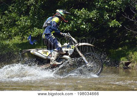 Sibiu, Romania - July 12 - 16 July: Copetitors In Red Bull Romaniacs Hard Enduro Rally With A Ktm Mo