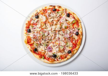 Pizza With Onion And Ham, Cheese And Tomato. White Background
