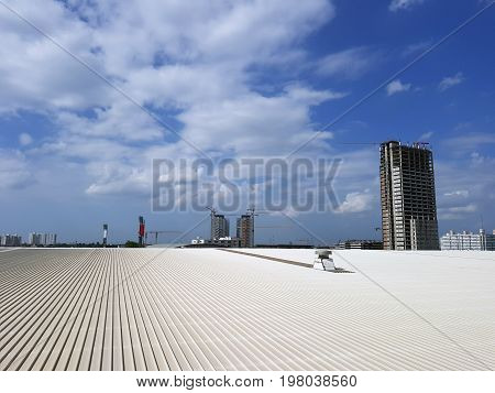roof of metal sheet building with clear blue sky background