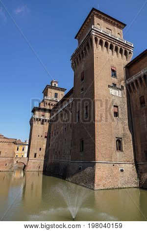 FERRARA, ITALY - JUNE 2017 : view of Castello Estense in Ferrara city. Castello Estense Este castle, Castello di San Michele, St Michael castle moated medieval castle in the center of town .