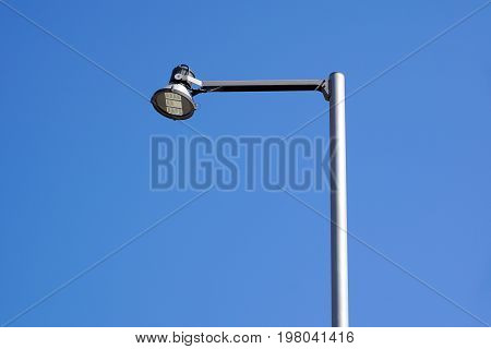 LED light on steet with blue sky .