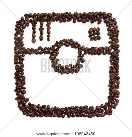 Kharkov, Ukraine - April 19, 2017: Icon of Instagram made of coffee beans on white background. Instagram is social network and simple way to capture and share the world's moments by photos