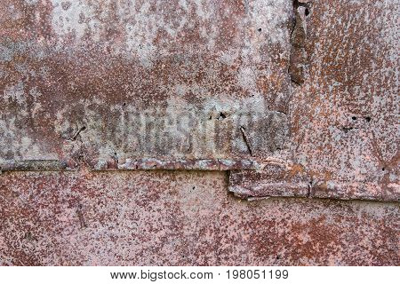 Background from sheet of old rusty iron nails