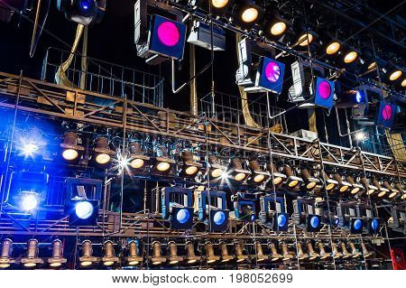 Lighting equipment on the stage. Multi-colored lights.