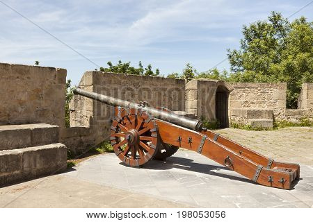 Ancient cannon at the La Mota Castle on top of Urgull mountain in the city of San Sebastian. Basque country Spain