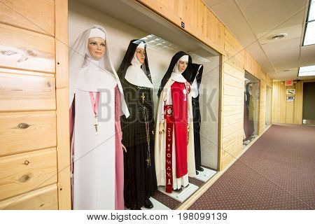 Indian River, Michigan, USA - July 25, 2017: The Nun Doll Museum at the Cross In The Woods Shrine in northern Michigan has over 525 nun dolls dressed in various habits. The unusual museum bills itself as the only nun doll museum in the world.