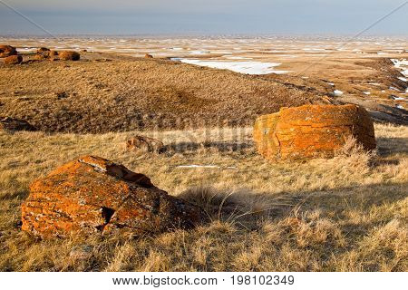 Unusual round red boulders in Red Rock Coulee in Southern Alberta, Canada.