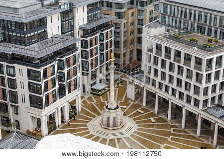 LONDON, GREAT BRITAIN - MAY 13, 2014: This is Paternoster Square near the St. Paul's Cathedral which originated in an area that suffered from bombing during the World War II.