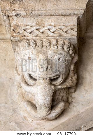 Monster or Tarasque Devouring a Sinner c12th Romanesque Carving in the Cloisters Montmajour Abbey near Arles Provence France