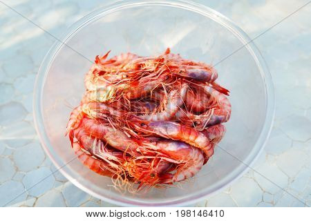 Fresh shrimps Gambos in a plate outdoors