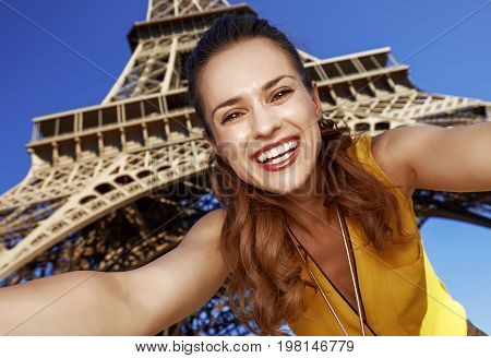 Happy Young Woman Taking Selfie While In Paris, France
