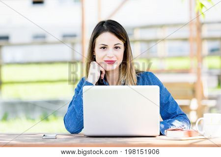 Young Woman Turning To Stare At The Camera